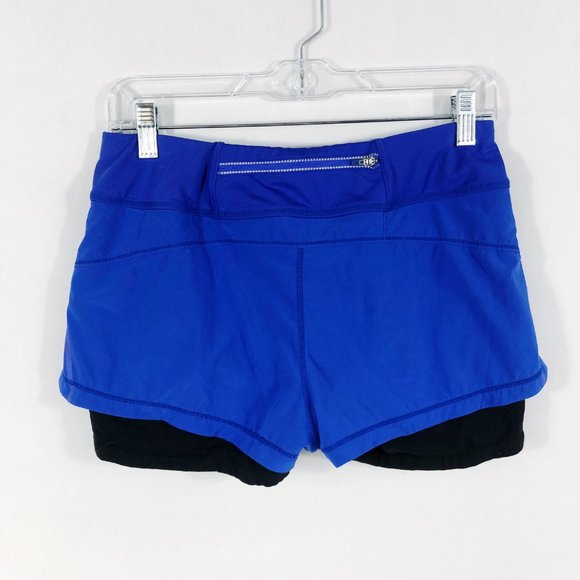 SOLD Athleta | 2 in 1 Pulse Shorts in Blue & Black - Picture 4 of 7